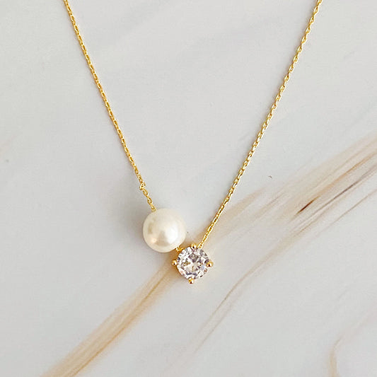 single pearl and diamond necklace
